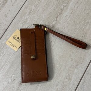 Patricia Nash Tan Leather Wristlet…nwt..10 slots ..ID
Window .. full zipper